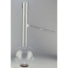 Laboratory glassware with a round bottom flask and side arm tube.