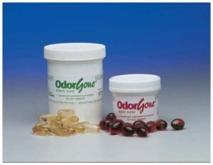 Two jars of OdorGone odor eliminator with samples of the product.